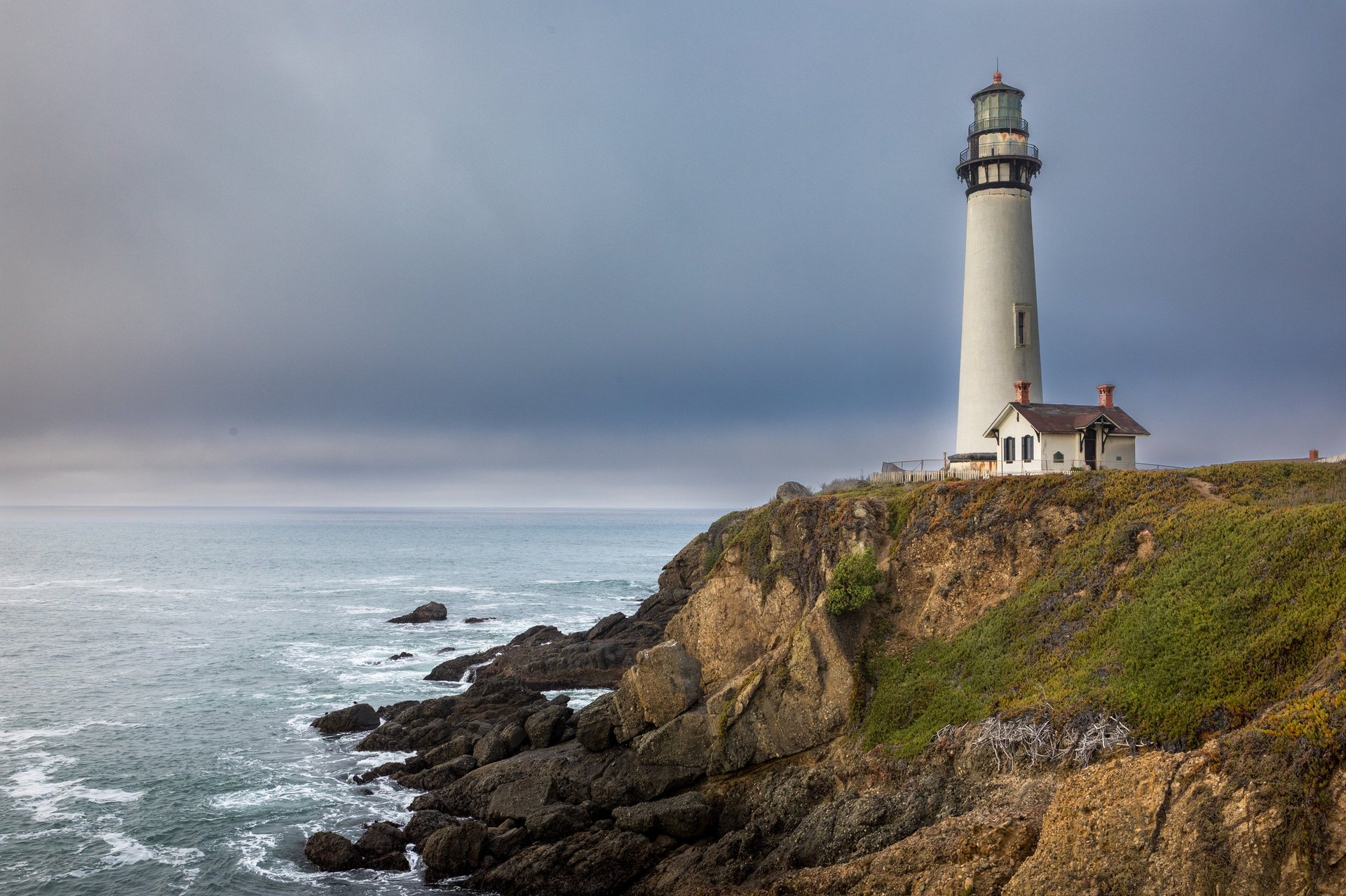 Coastal Lighthouse on a Cliffside With White Keeper's House in Monterey, California